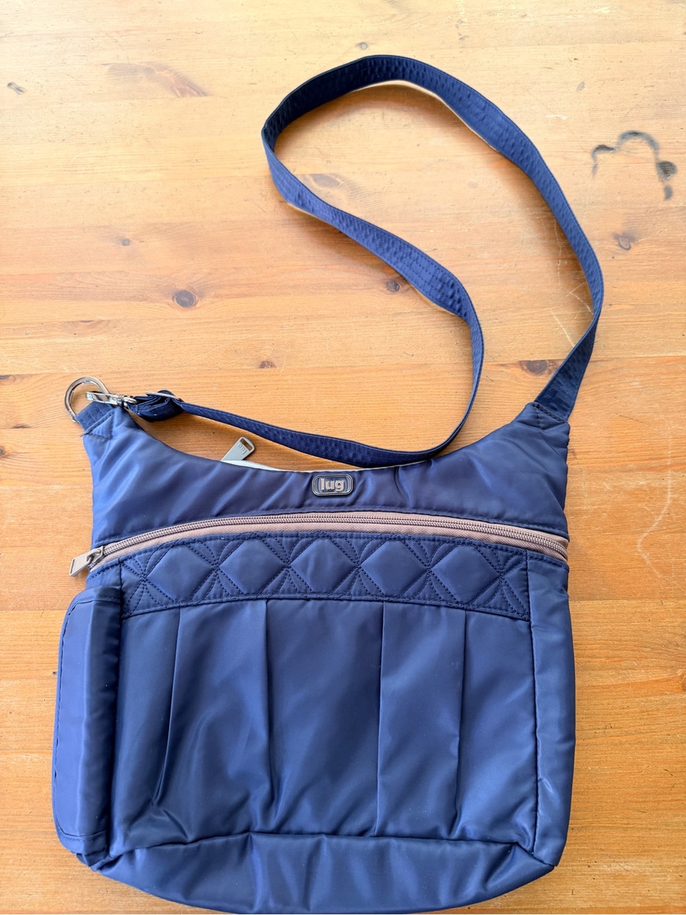 Lug Navy Quilted Swing Crossbody Bag
Purse Bag Pockets & water bottle holder